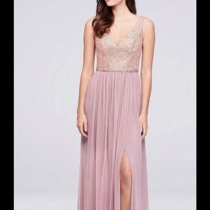 Formal gown blush. Deep neck line. With a sheer material that looks very sexy